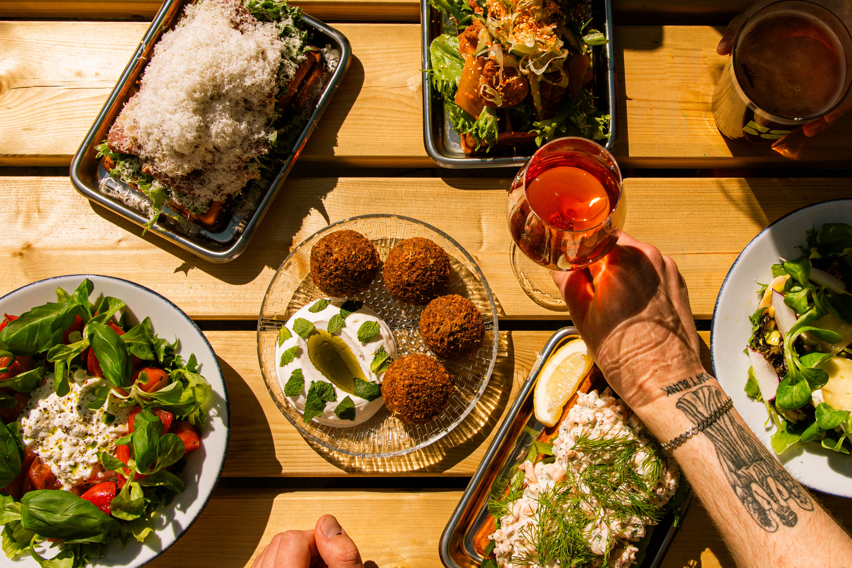 Sustainable brunch at Hobo Hotel in central Stockholm with fluffy stacked waffles, flavorful falafel, colorful seasonal salads and refreshing natural wine.